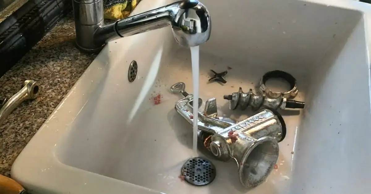 Soak the meat grinder parts
