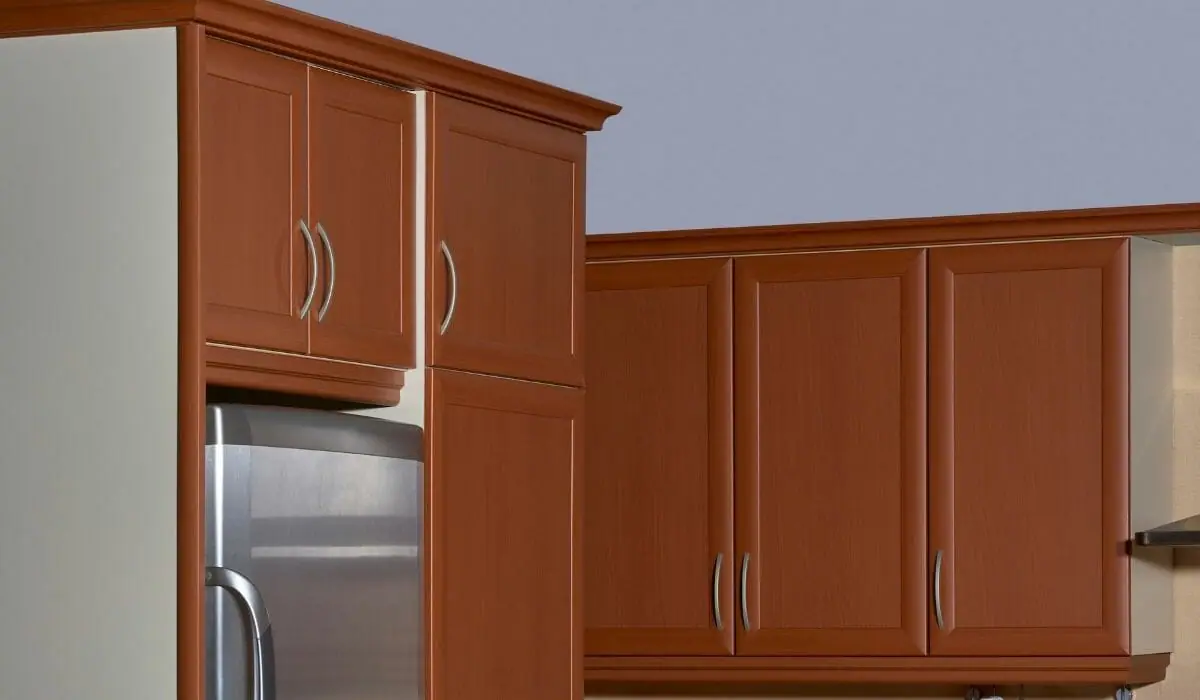 Do you put a clear coat on kitchen cabinets?