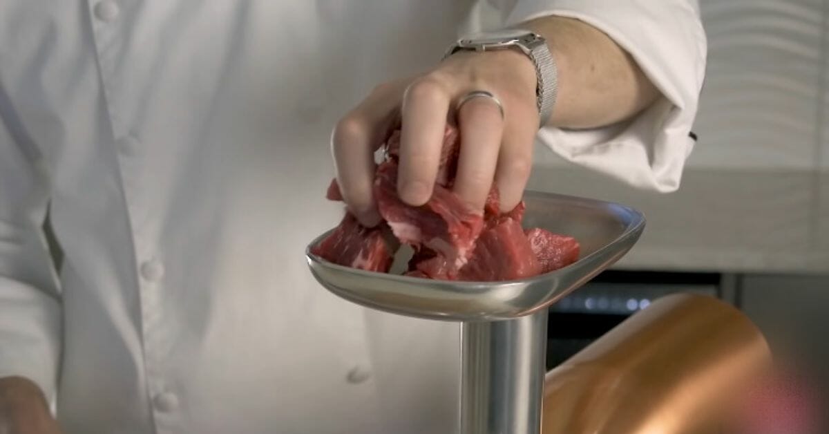 how does the kitchenaid meat grinder work